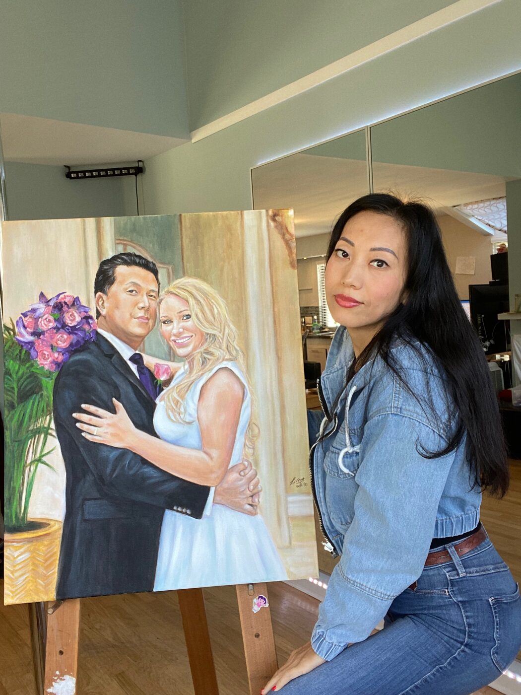 Liang with a finished wedding oil painting